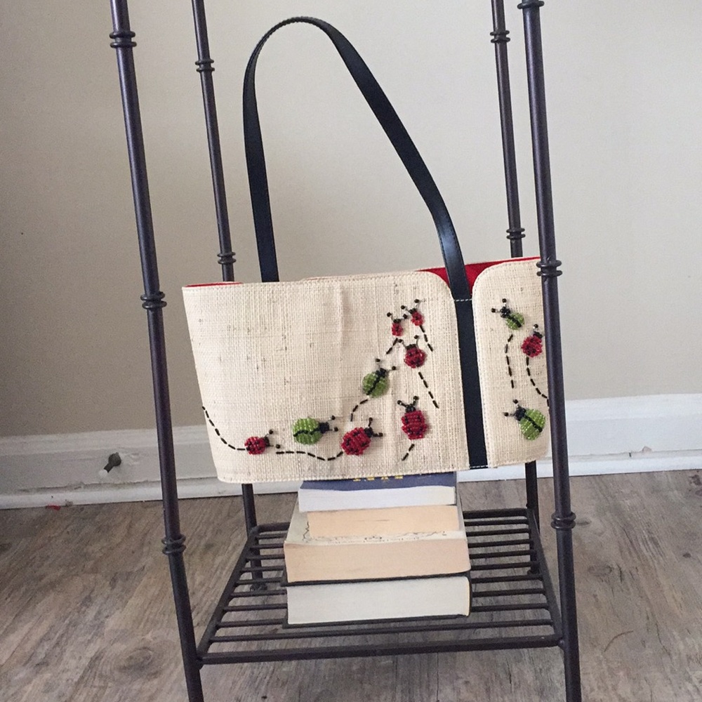 Adorable beaded straw handbag.